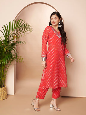 Women Ethnic Motifs Printed Regular Mirror Work Kurta with Trousers
