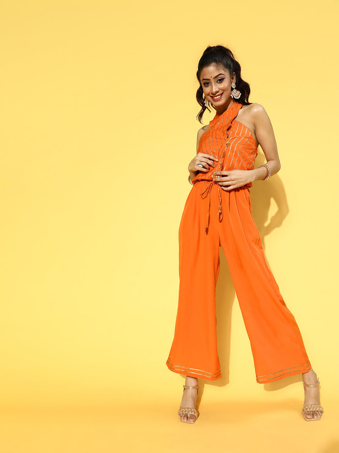 Ahalyaa Womens Orange Crepe Gold Stripped Print Jumpsuit